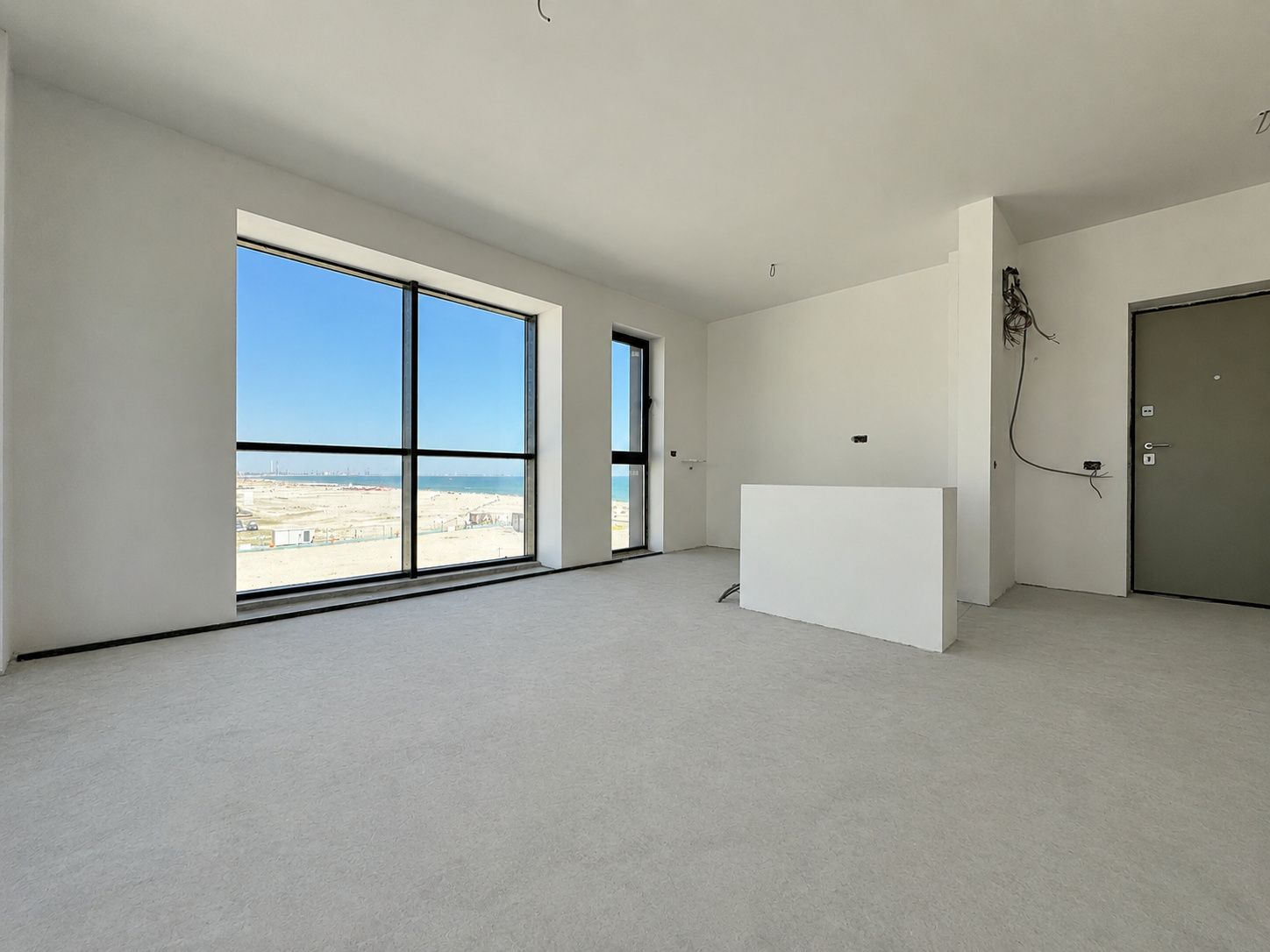 Finalizat | Apartament pe plaja cu vedere la mare în imobil premium